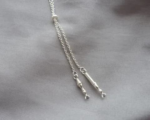 Photoreceptor silver necklace