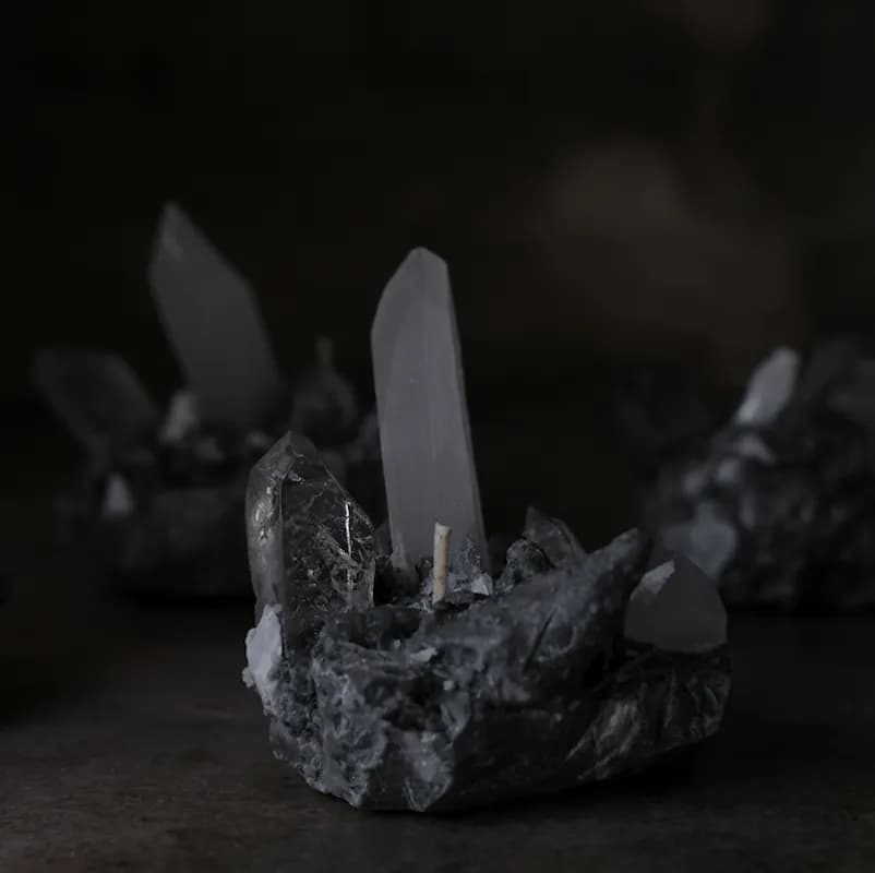 Tings Aroma's crystal scented candle, clearly visible against a dark background.